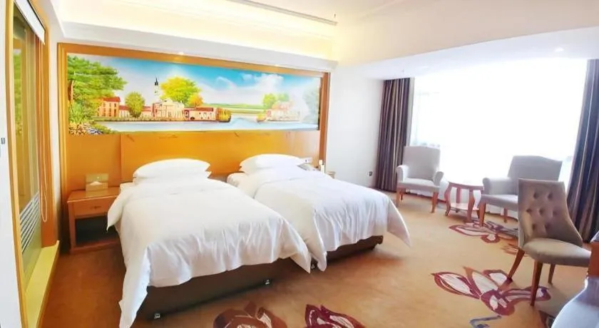 Bed in Vienna Hotel Guangdong Shaoguan Renhua Danxiashan County Center