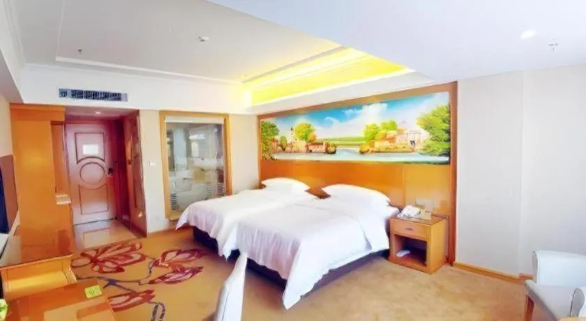Bed in Vienna Hotel Guangdong Shaoguan Renhua Danxiashan County Center
