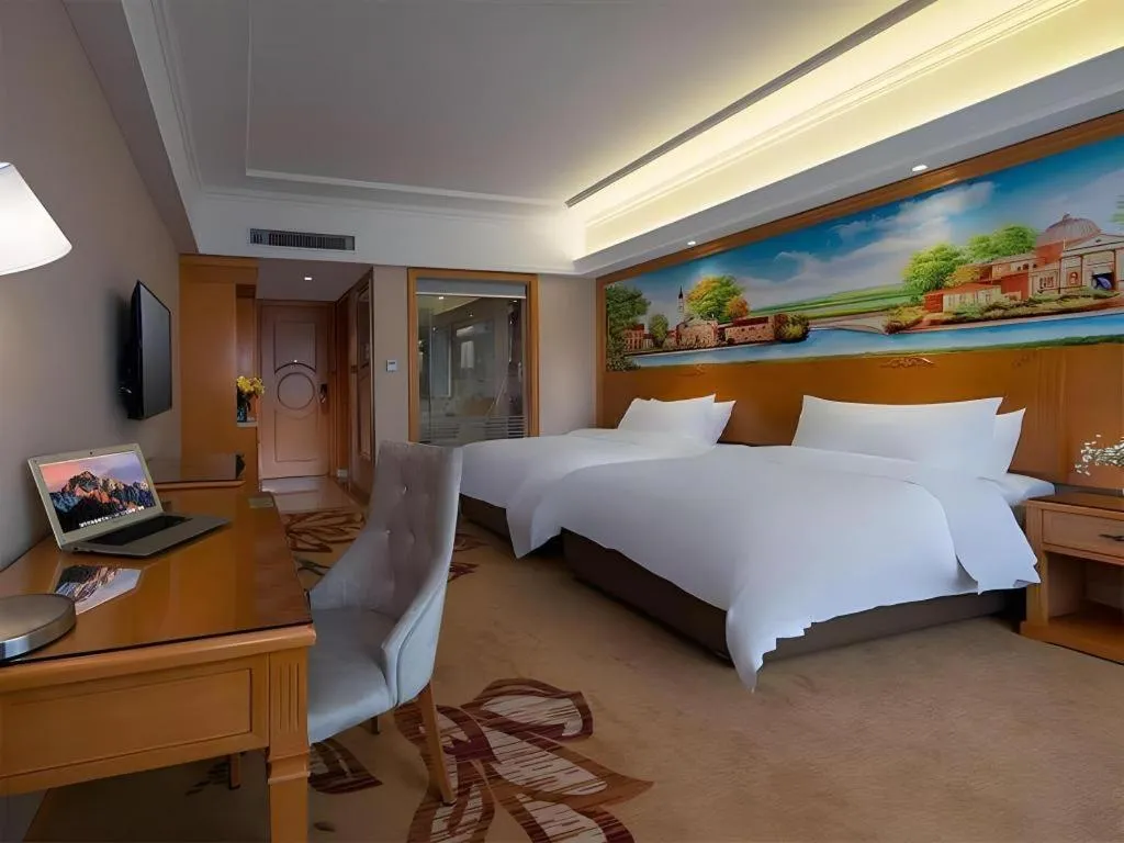 Bed in Vienna Hotel Guangdong Shaoguan Renhua Danxiashan County Center