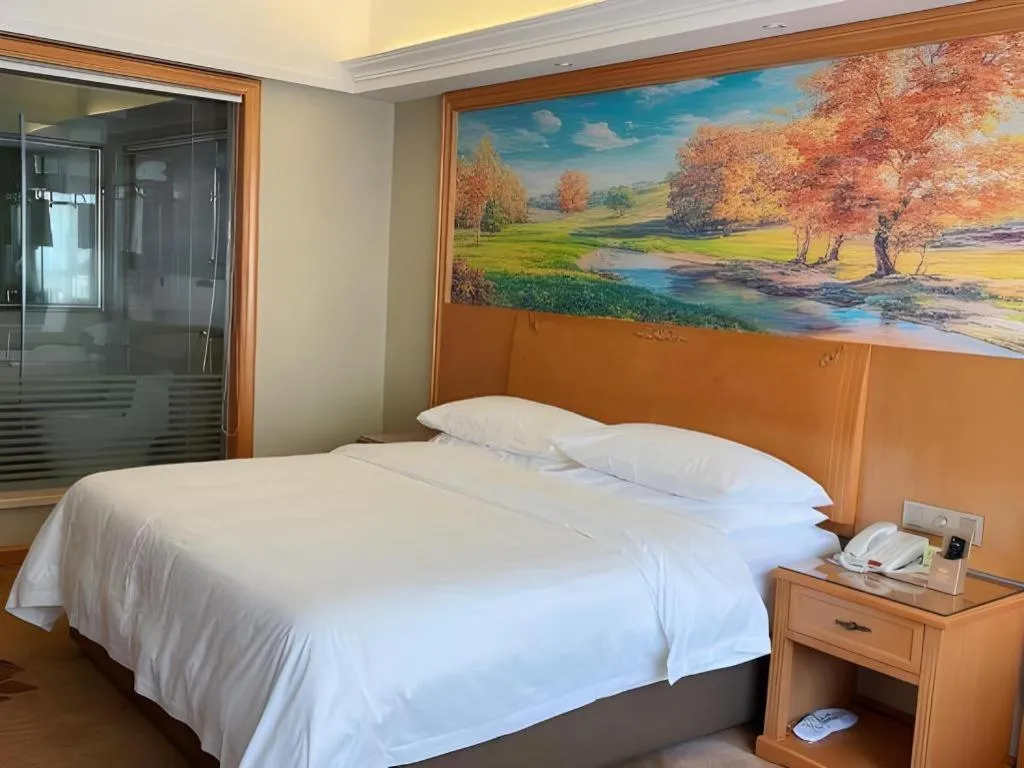 Bed in Vienna Hotel Guangdong Shaoguan Renhua Danxiashan County Center