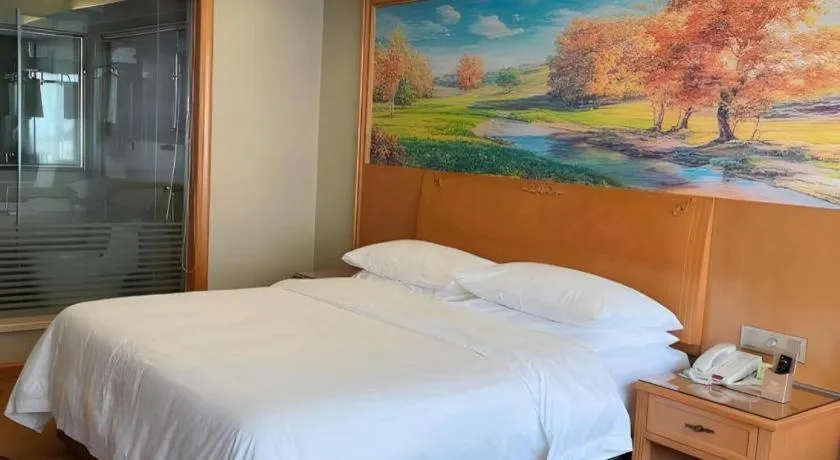 Bed in Vienna Hotel Guangdong Shaoguan Renhua Danxiashan County Center