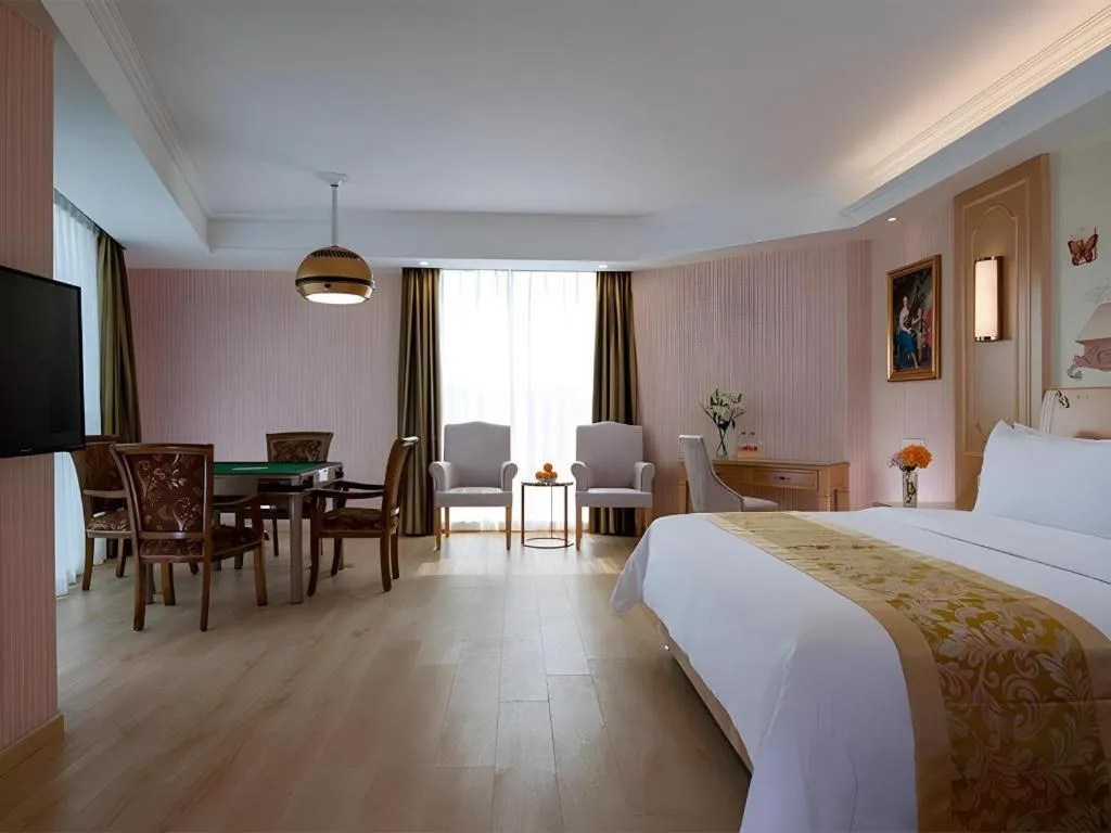 Bed in Vienna Hotel Chengdu Chadianzi Toursim Center