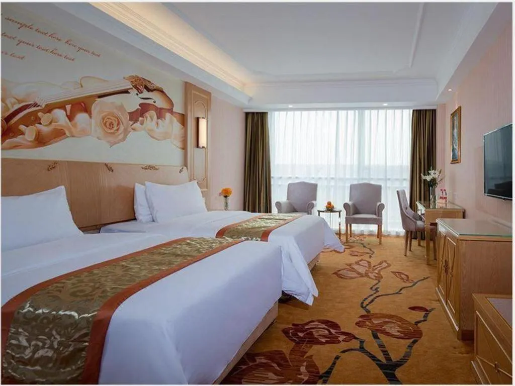 Bed in Vienna Hotel Chengdu Chadianzi Toursim Center