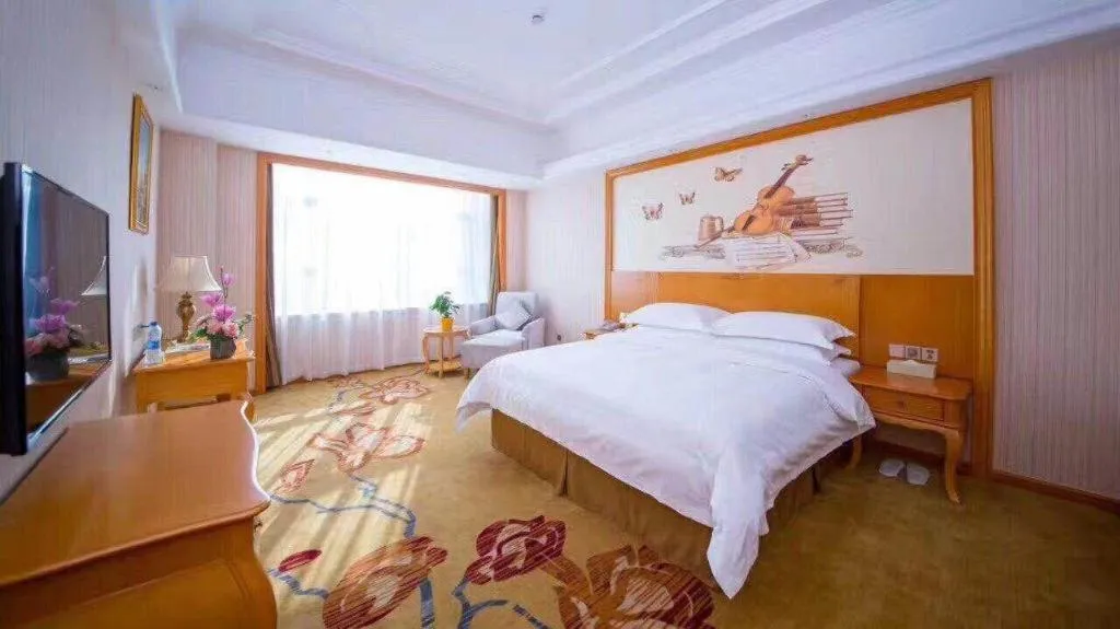 Bed in Vienna Hotel Chengdu Chadianzi Toursim Center