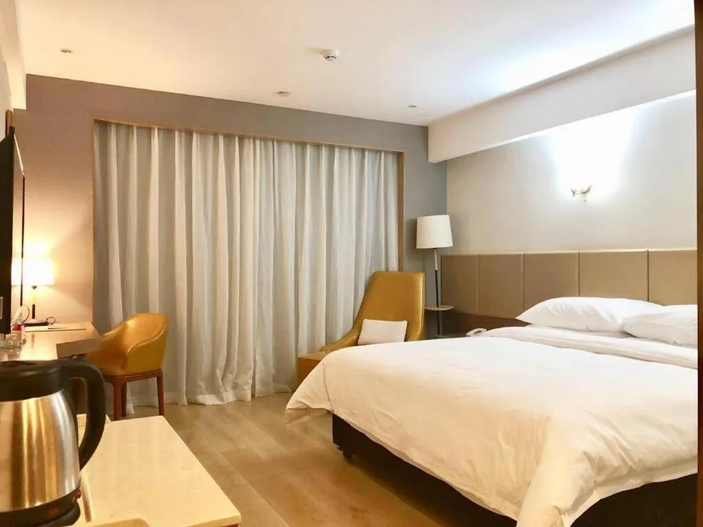 Bed in Vienna Hotel Chengdu Chadianzi Toursim Center