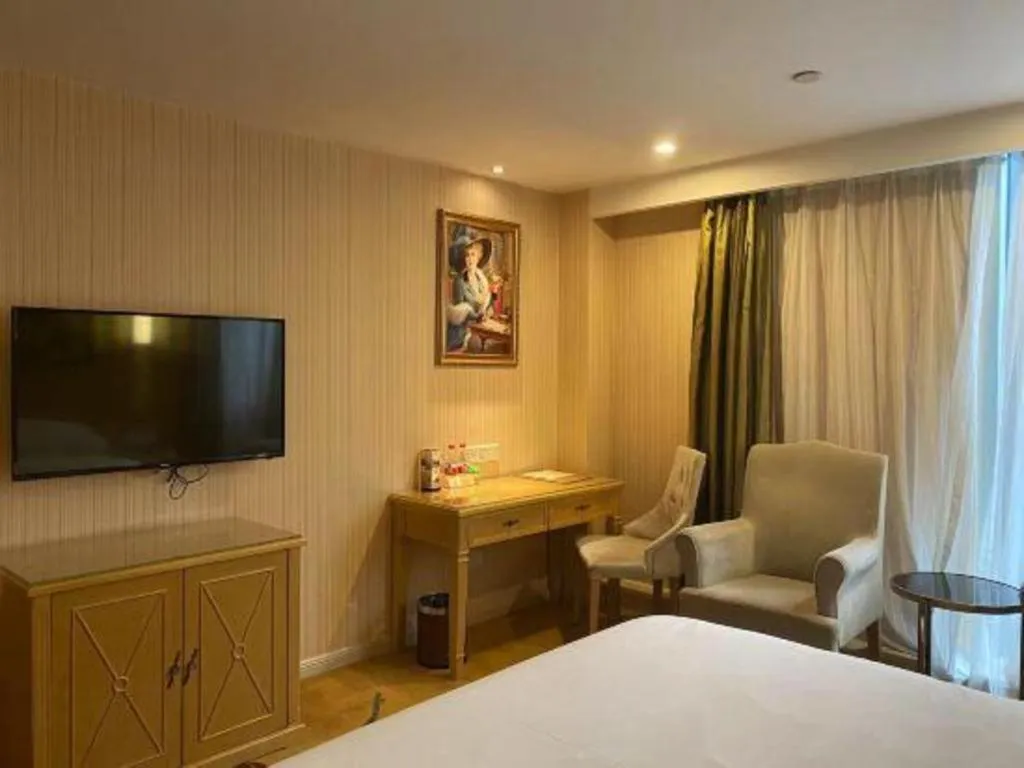 Bed in Vienna Hotel Chengdu Chadianzi Toursim Center