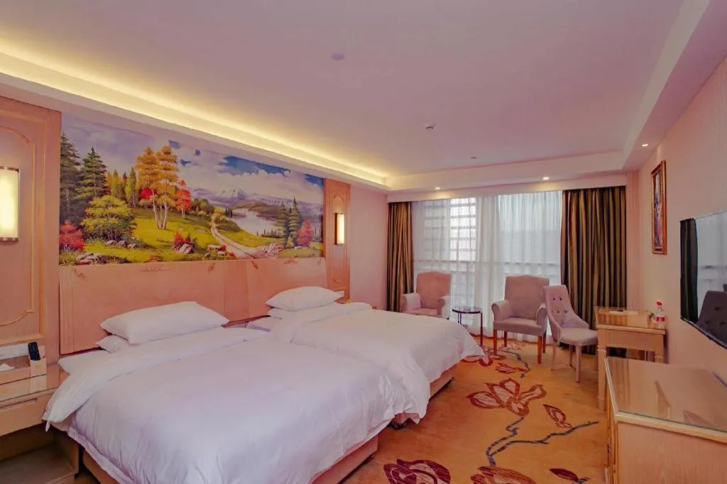 Bed in Vienna Hotel Chengdu Chadianzi Toursim Center