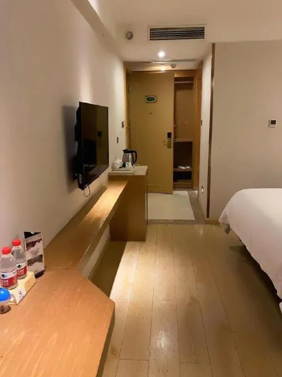 Bed in Vienna Hotel Chengdu Chadianzi Toursim Center