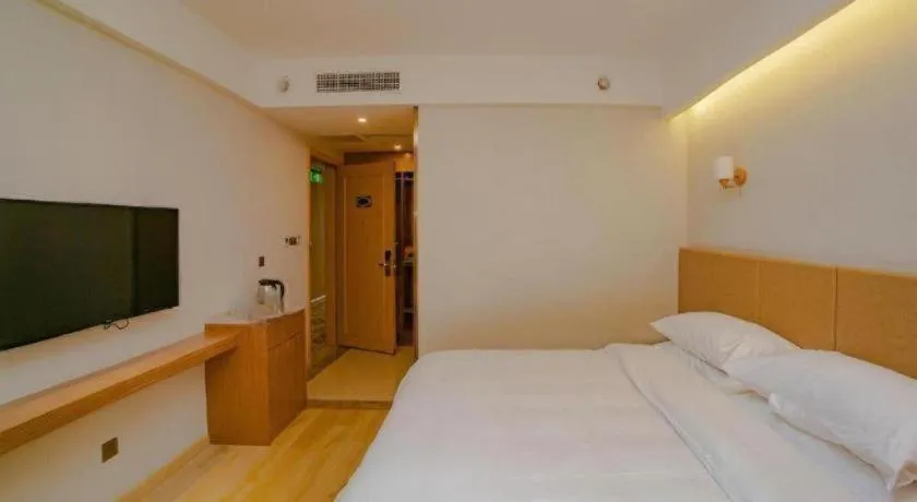 Bed in Vienna Hotel Chengdu Chadianzi Toursim Center