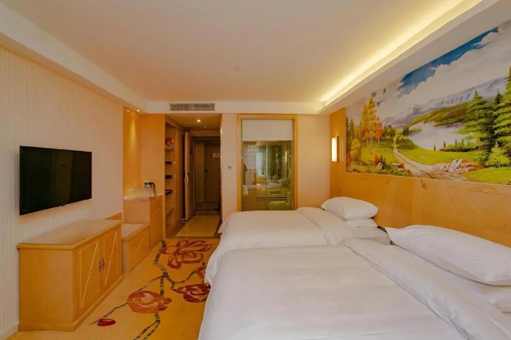 Bed in Vienna Hotel Chengdu Chadianzi Toursim Center