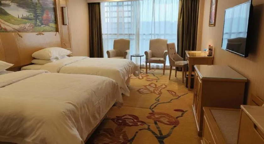 Bed in Vienna Hotel Chengdu Chadianzi Toursim Center