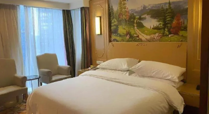 Bed in Vienna Hotel Chengdu Chadianzi Toursim Center