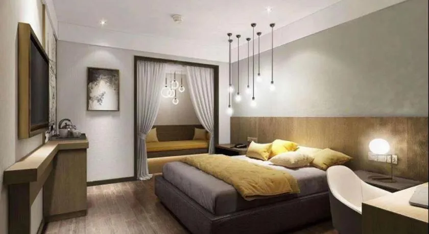 Bed in Vienna Hotel Chengdu Chadianzi Toursim Center