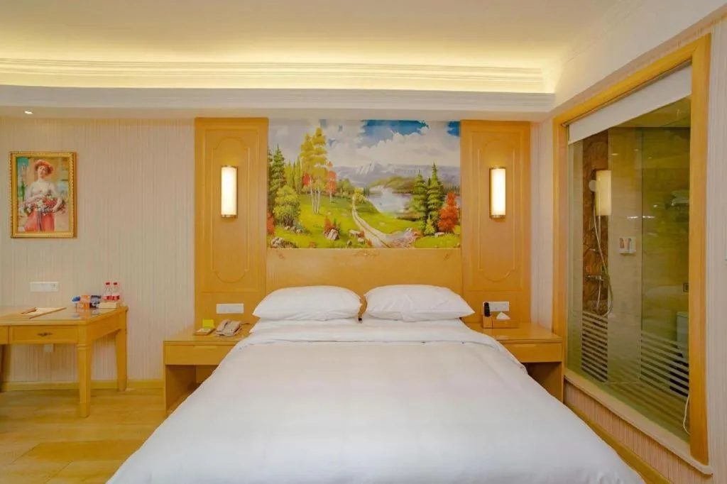 Bed in Vienna Hotel Chengdu Chadianzi Toursim Center