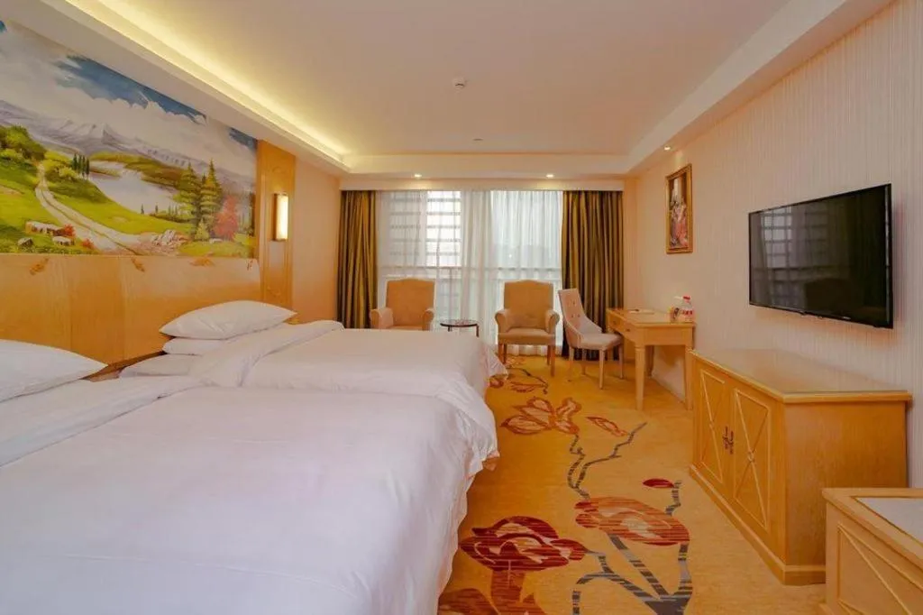 Bed in Vienna Hotel Chengdu Chadianzi Toursim Center