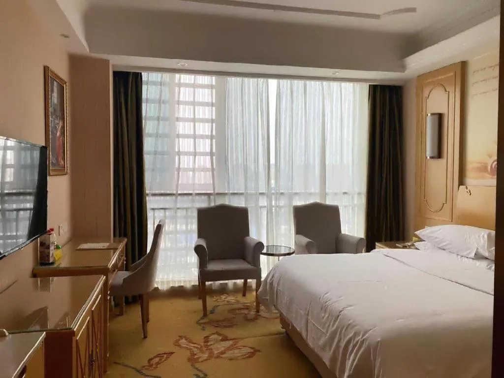 Bed in Vienna Hotel Chengdu Chadianzi Toursim Center