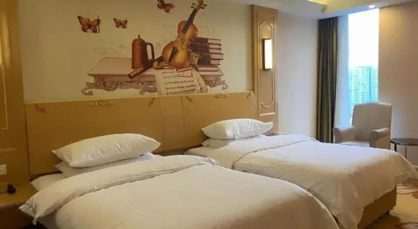 Bed in Vienna Hotel Chengdu Chadianzi Toursim Center