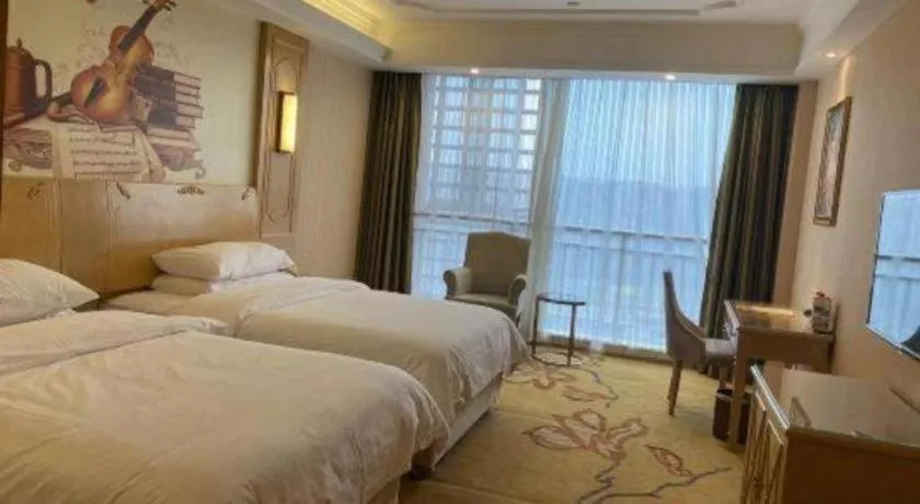 Bed in Vienna Hotel Chengdu Chadianzi Toursim Center