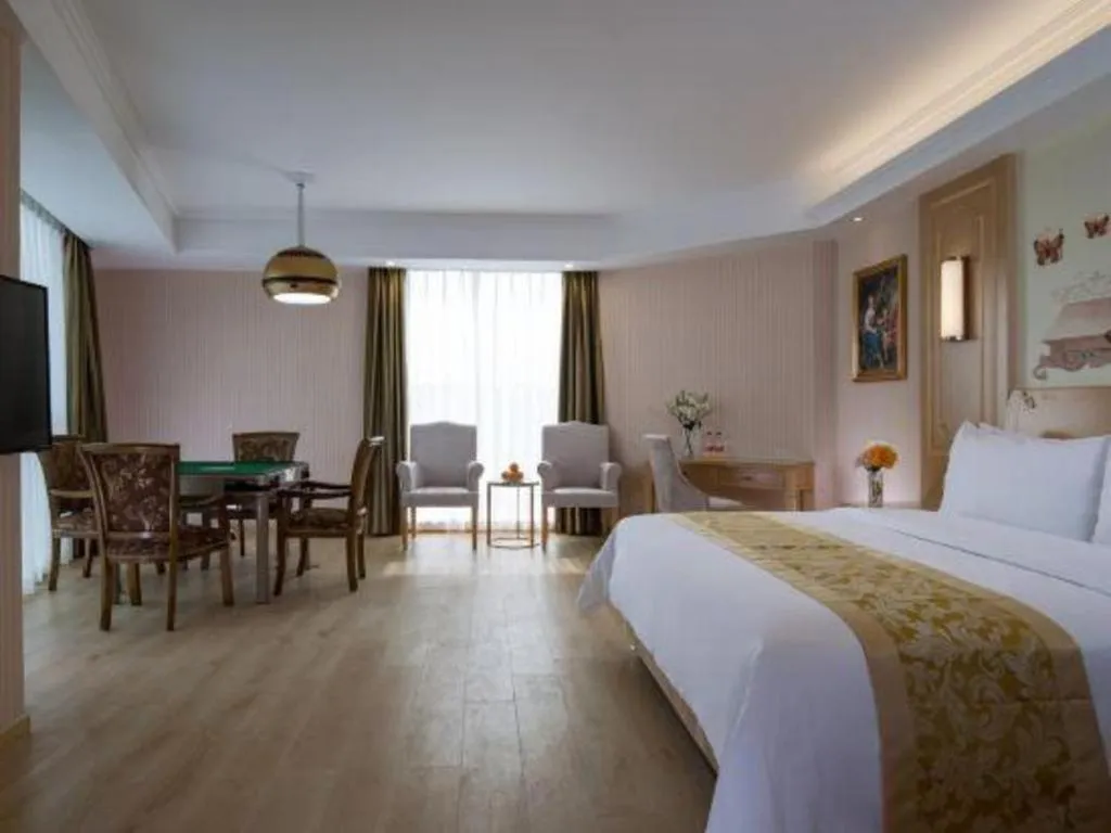 Bed in Vienna Hotel Chengdu Chadianzi Toursim Center