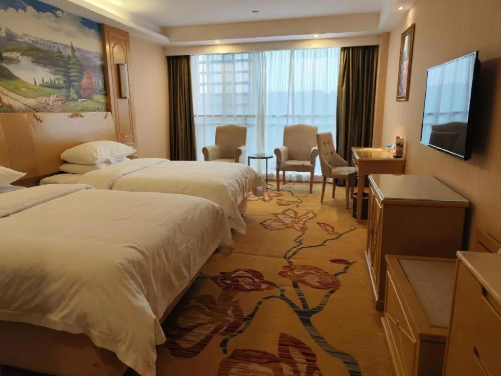 Bed in Vienna Hotel Chengdu Chadianzi Toursim Center