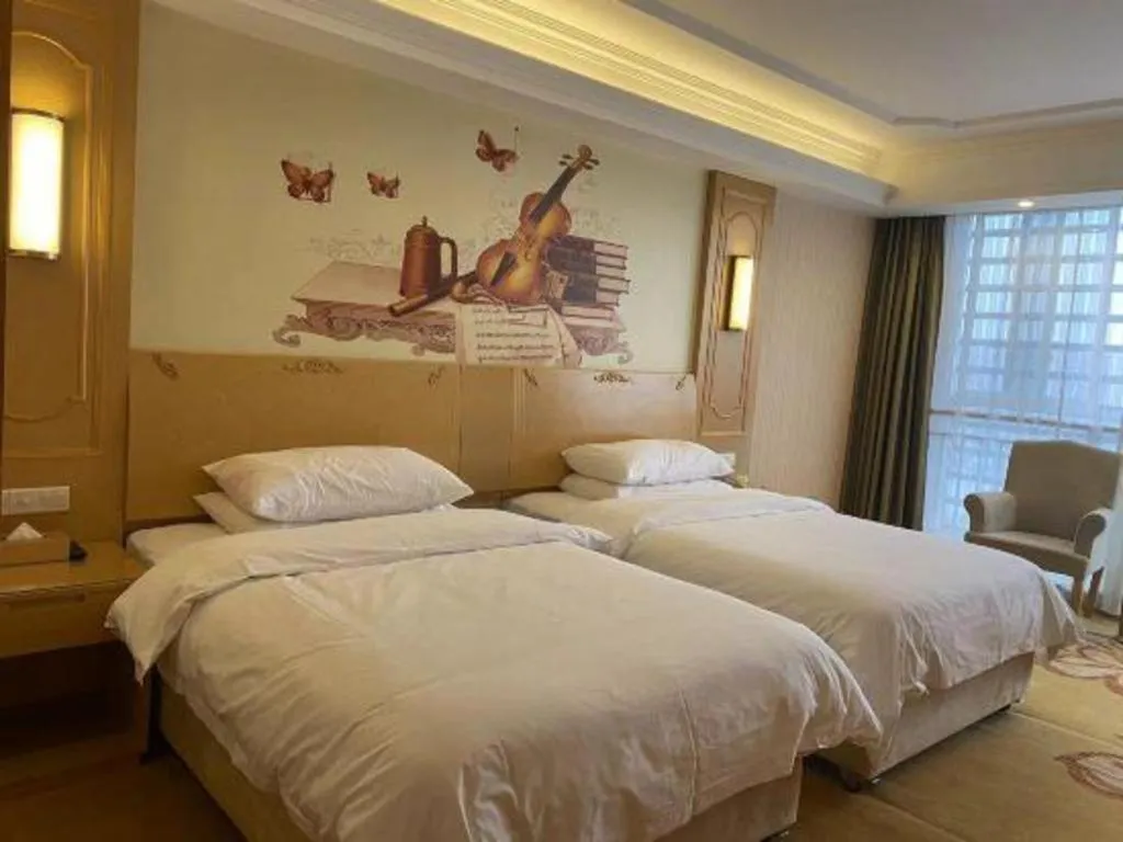 Bed in Vienna Hotel Chengdu Chadianzi Toursim Center