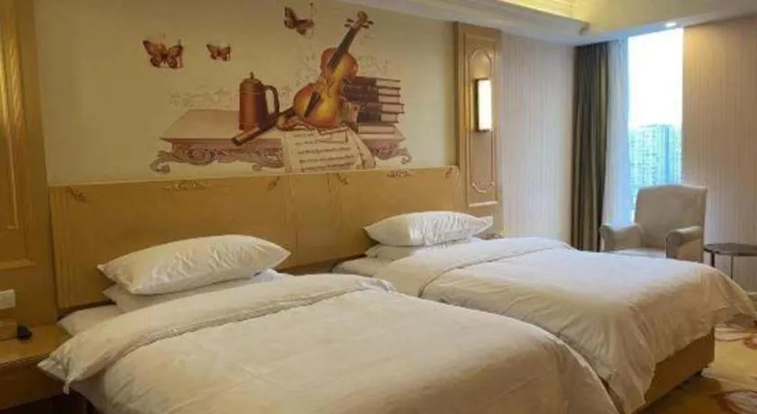 Bed in Vienna Hotel Chengdu Chadianzi Toursim Center