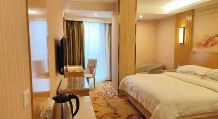 Bed in Vienna Hotel Chengdu Chadianzi Toursim Center