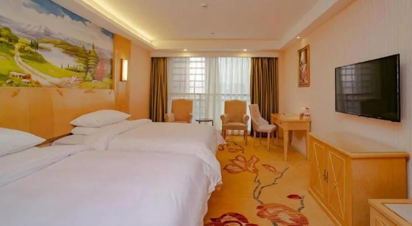 Bed in Vienna Hotel Chengdu Chadianzi Toursim Center