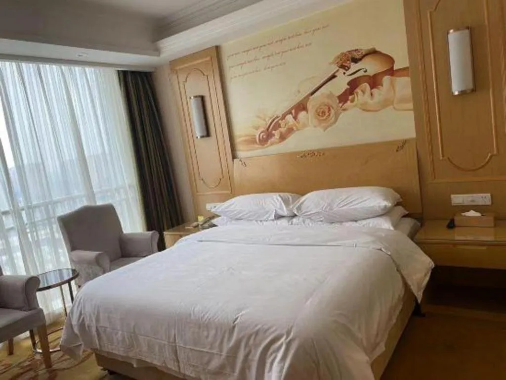 Bed in Vienna Hotel Chengdu Chadianzi Toursim Center