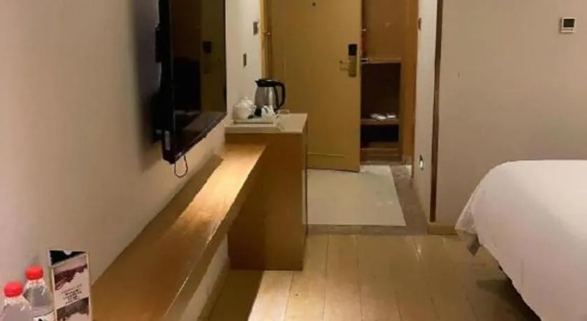 Bed in Vienna Hotel Chengdu Chadianzi Toursim Center