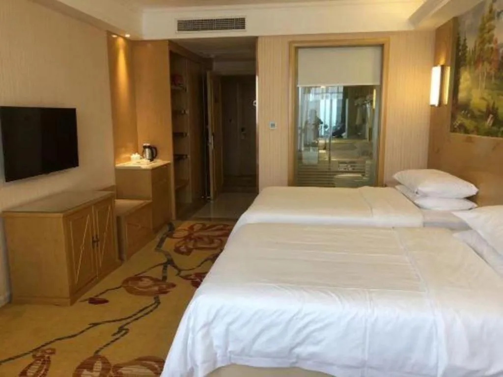 Bed in Vienna Hotel Chengdu Chadianzi Toursim Center