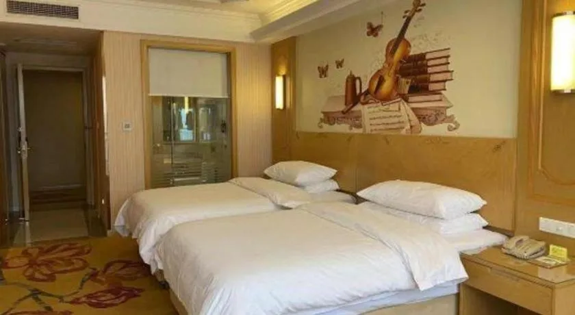 Bed in Vienna Hotel Chengdu Chadianzi Toursim Center