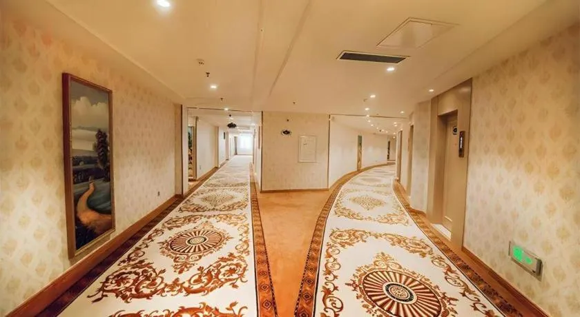 Bed in Vienna Hotel Shandong Linyi Mengyin