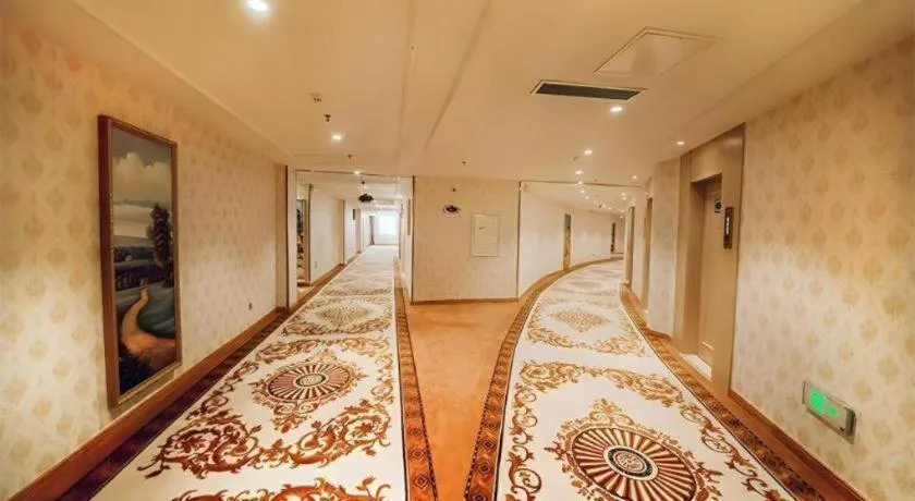 Bed in Vienna Hotel Shandong Linyi Mengyin