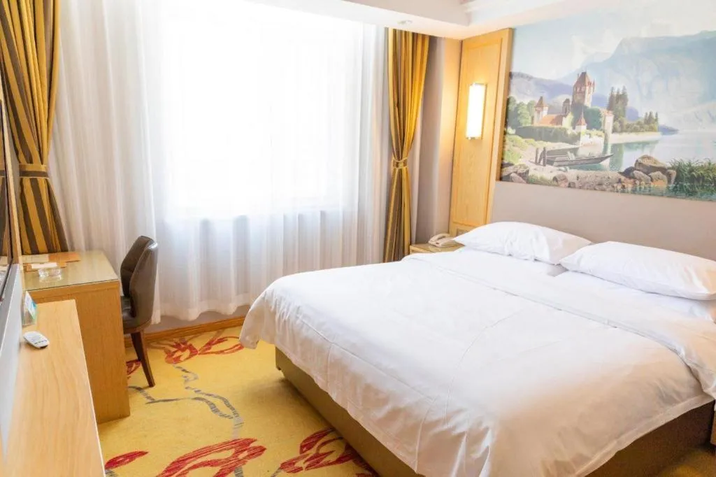 Bed in Vienna Hotel Shandong Linyi Mengyin