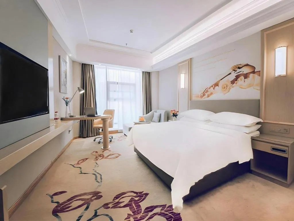 Bed in Vienna Hotel Shandong Linyi Mengyin