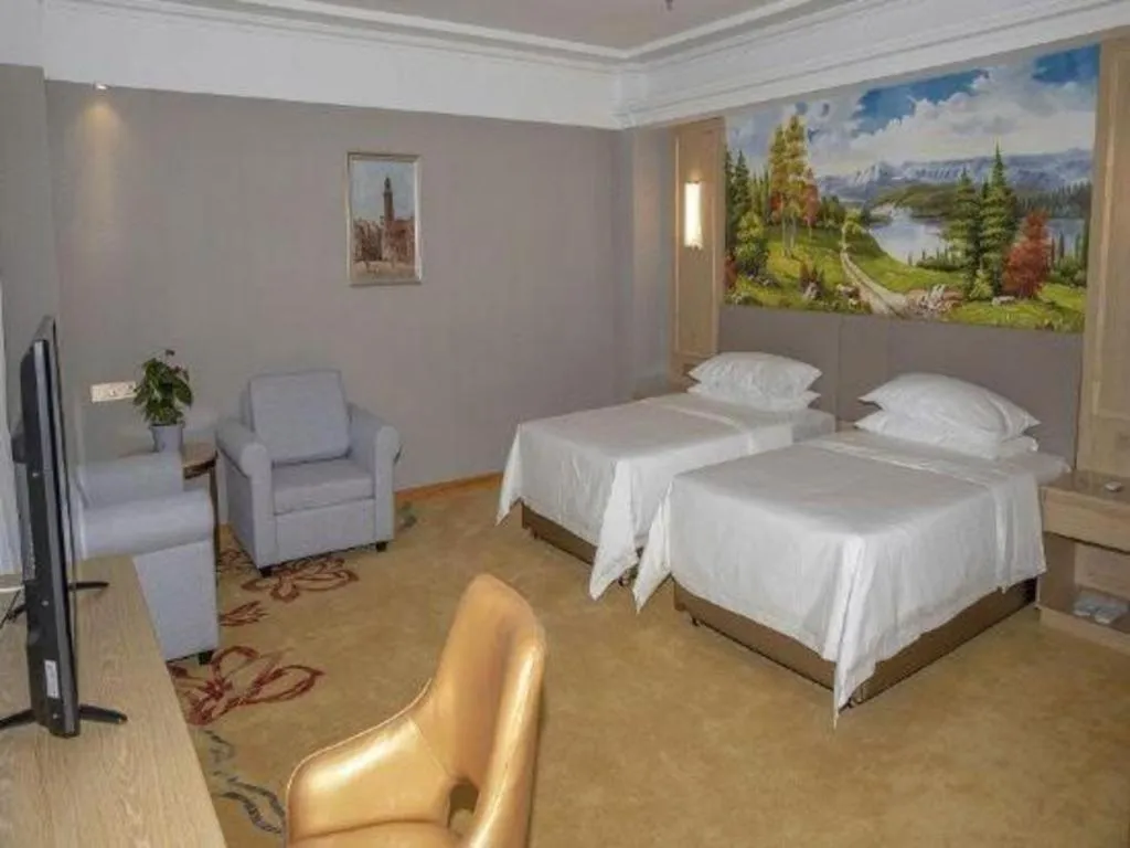 Bed in Vienna Hotel Shandong Linyi Mengyin