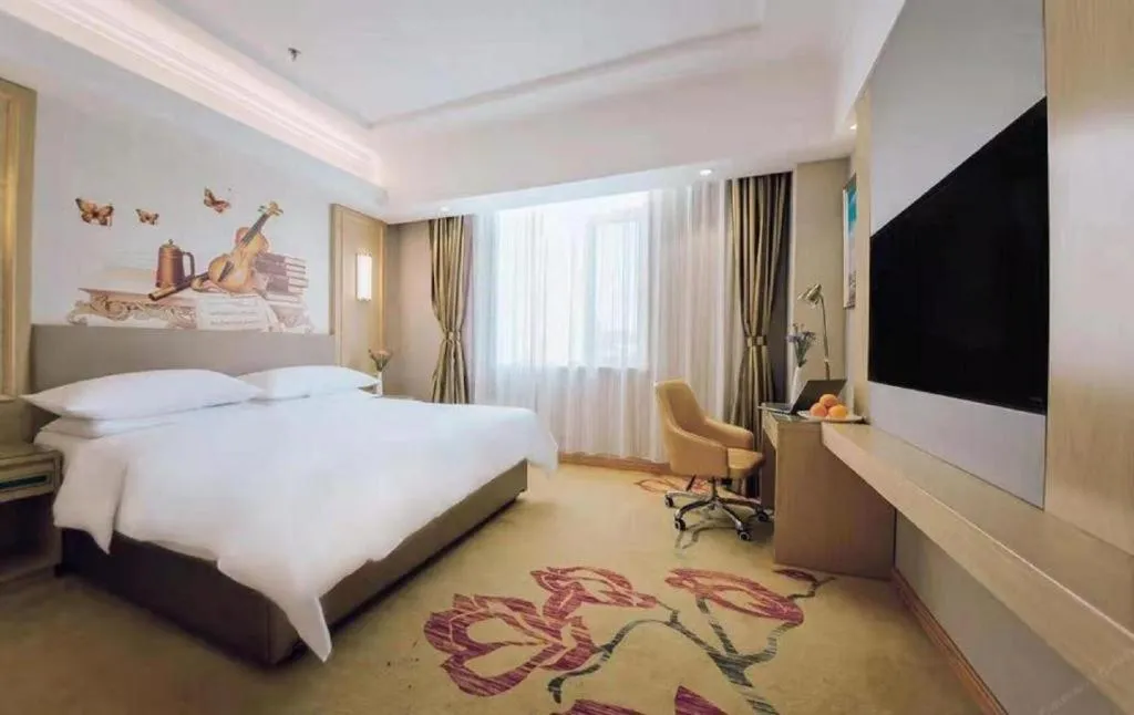 Bed in Vienna Hotel Shandong Linyi Mengyin