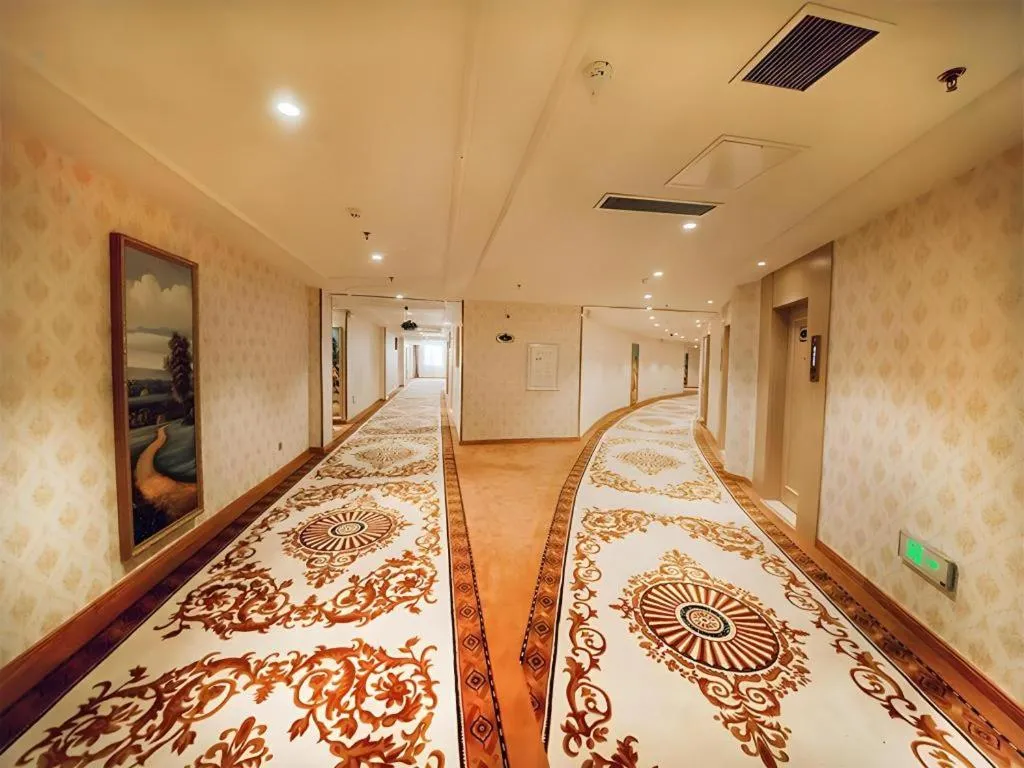 Bed in Vienna Hotel Shandong Linyi Mengyin