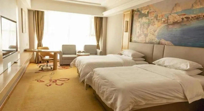 Bed in Vienna Hotel Shandong Linyi Mengyin