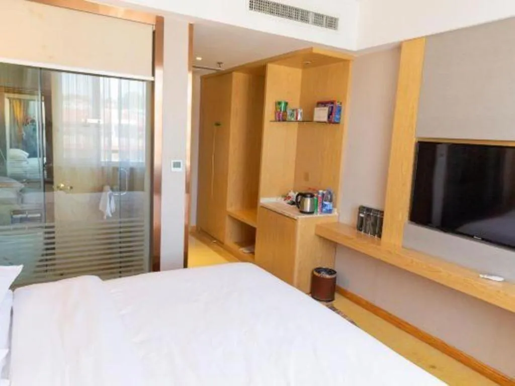 Bed in Vienna Hotel Shandong Linyi Mengyin