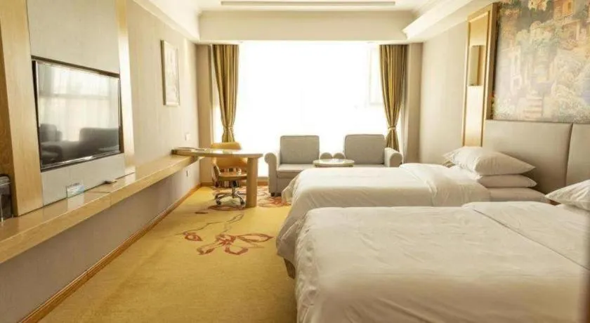 Bed in Vienna Hotel Shandong Linyi Mengyin