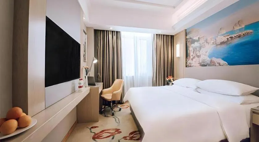 Bed in Vienna Hotel Shandong Linyi Mengyin