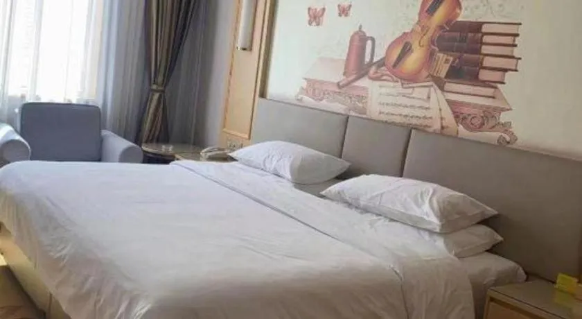 Bed in Vienna Hotel Shandong Linyi Mengyin