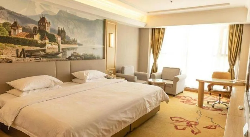Bed in Vienna Hotel Shandong Linyi Mengyin