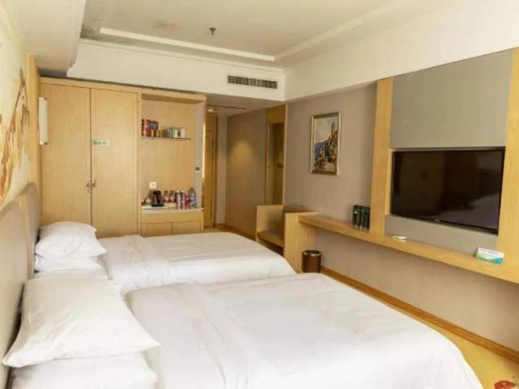 Bed in Vienna Hotel Shandong Linyi Mengyin
