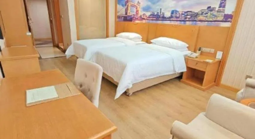 Bed in Vienna Hotel Hubei Enshi Railway Station