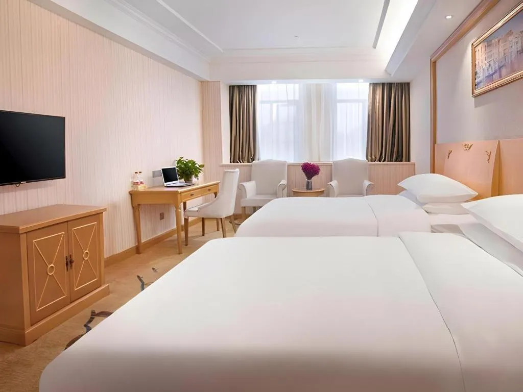 Bed in Vienna Hotel Hubei Enshi Railway Station