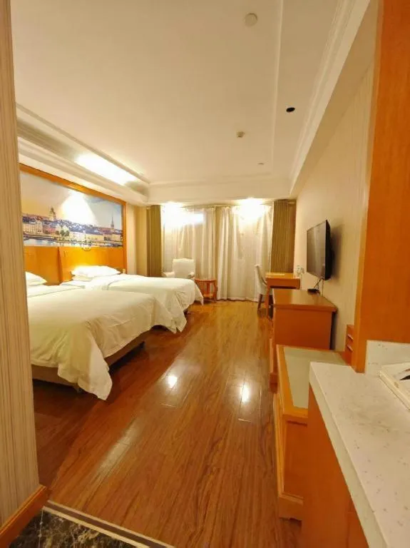 Bed in Vienna Hotel Hubei Enshi Railway Station