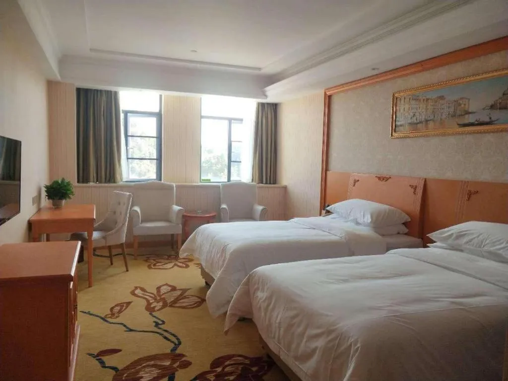 Bed in Vienna Hotel Hubei Enshi Railway Station